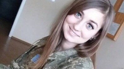 ウクライナの女性兵士、ロシア軍にめちゃくちゃにされ発見される….jpg