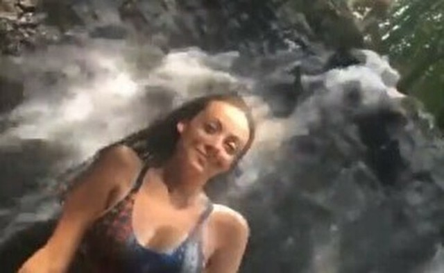 滝の淵から滝つぼを見下ろす女性と落ちて来た人.jpg